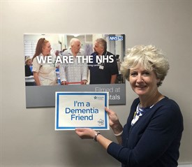 Trust Chief Executive Susan Acott with a Dementia Friends sign