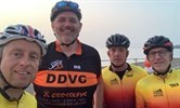 Avatar of Dave, far right, and his fellow riders at the start of the ride. Image shows the heads and shoulders of four men in cycling gear