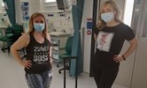 Avatar of Jeanette Stanford and Iwona King after the Zumba session. They are pictured wearing exercise clothing; Jeanette's top has a message about Zumba on it. Both are wearing surgical facemasks