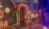 Avatar of John Parker's Christmas lights in Canterbury. Image shows a house and garden decorated with Christmas lights of all colours and shapes