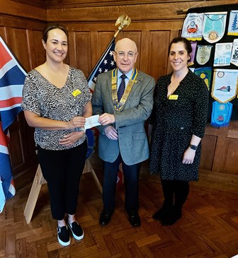 Rotary presentation to Viking Day Unit. Image shows Carrie Merry, Chris Hedges and Joanna Watungwa with a cheque