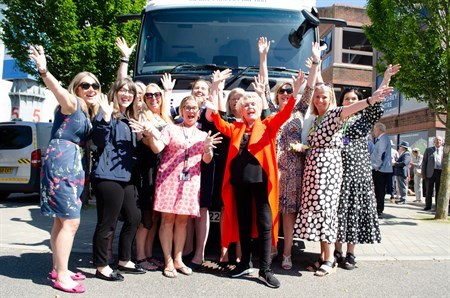 Gloria Hunniford with staff from Hope for Tomorrow and East Kent Hospitals. They are standing in front of the new mobile cancer care unit
