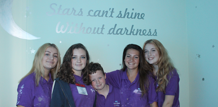 Teenagers brighten rooms for children and parents at QEQM