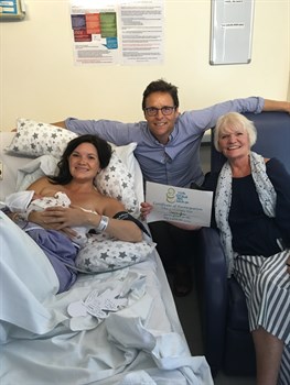 Jennifer Brisk with new baby Guinevere, fiance Thomas Joosven and her mum Christine