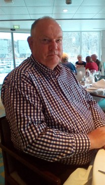 Leslie Beddow who had a complex aortic aneurysm repair. Image shows Leslie's head and shoulders, he is pictured in a restaurant setting
