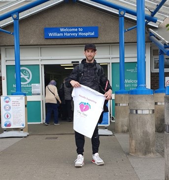 Rickie Wrightson after his walk from Margate to the William Harvey Hospital. He is pictured standing outside the main entrance to the WHH holding a t-shirt for the Tiny Toes appeal