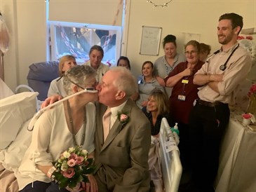 Pauline Manning and Alan Christie at their wedding with ward staff