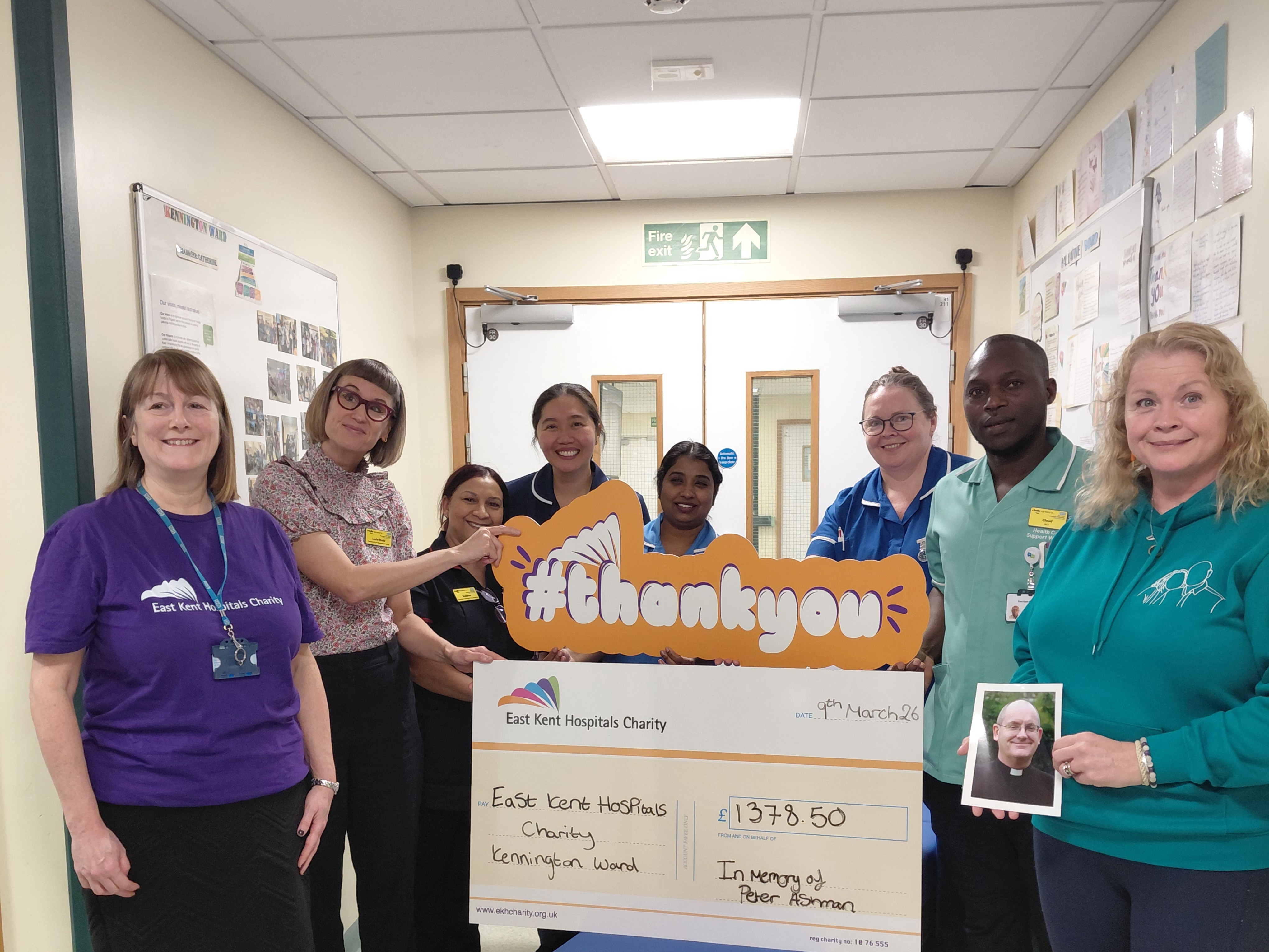 Jane hands over a giant cheque to the team on Kennington ward