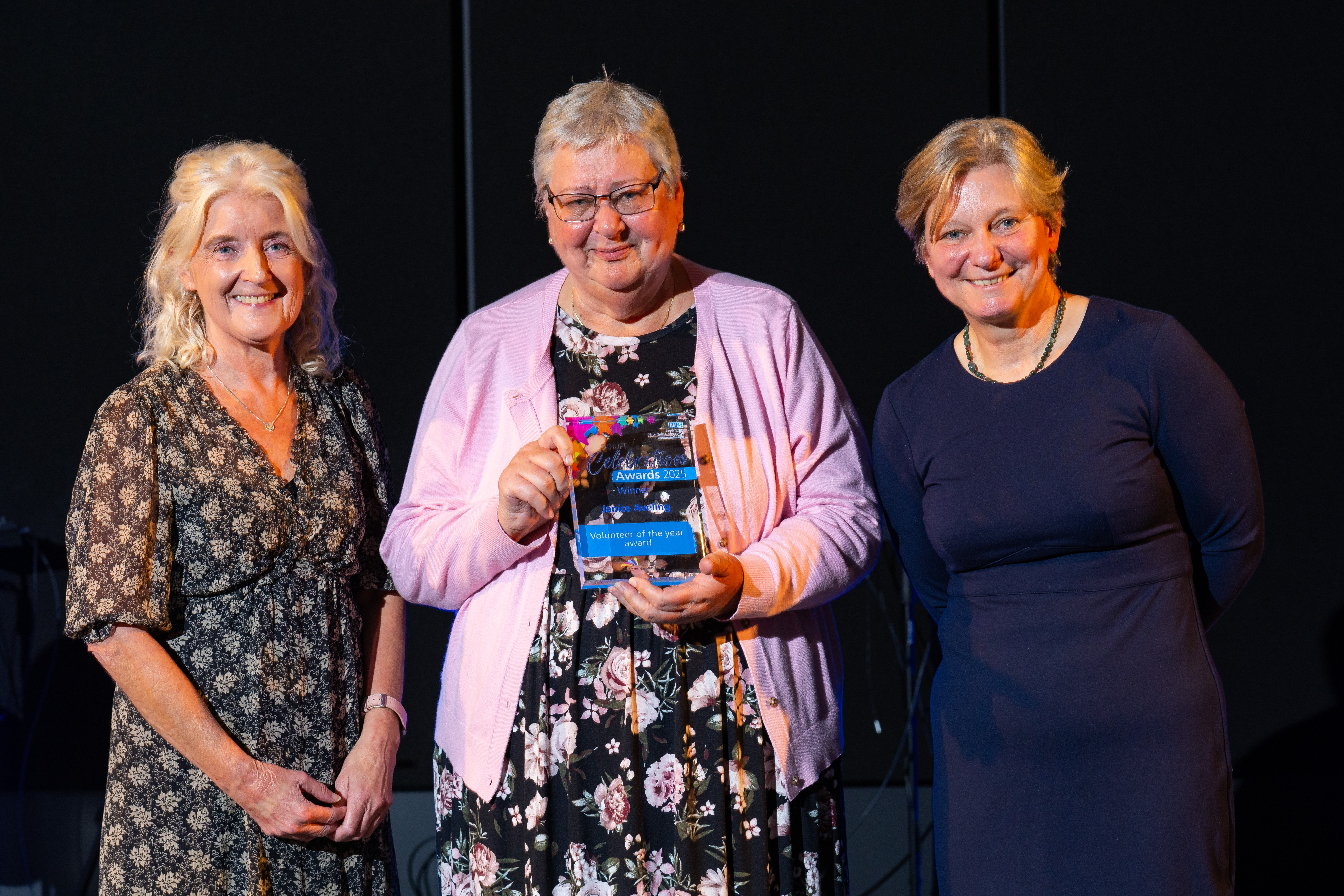 Annette Doherty and Tracey Fletcher with Jan Aveling. She is holding her award.
