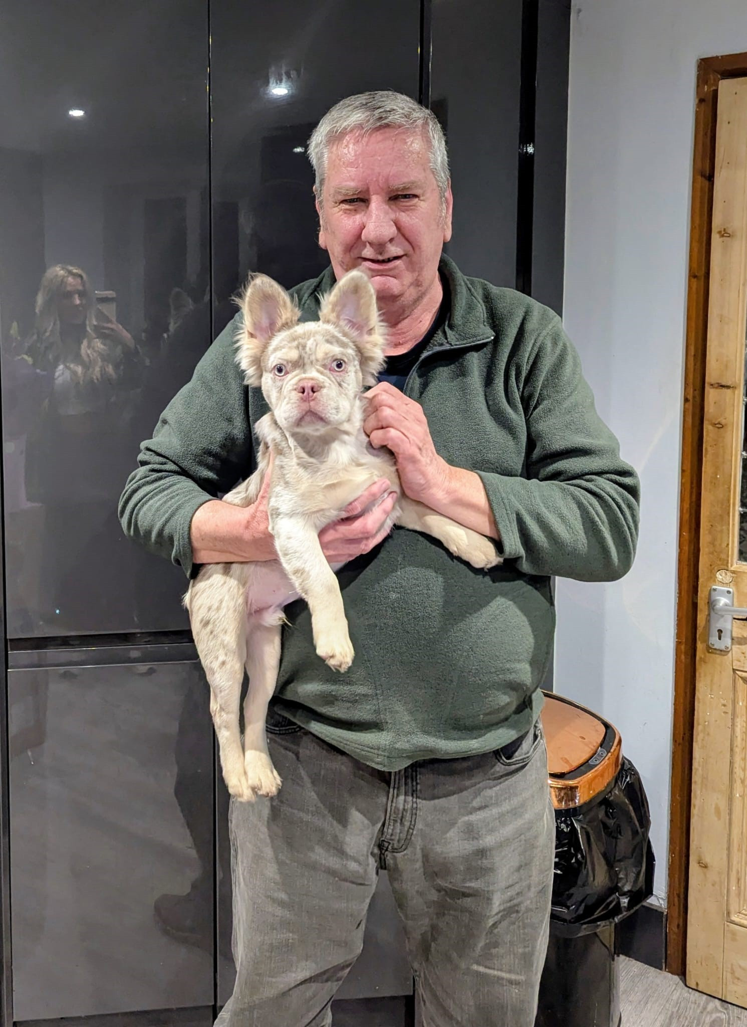 David Haddway, holding a small dog