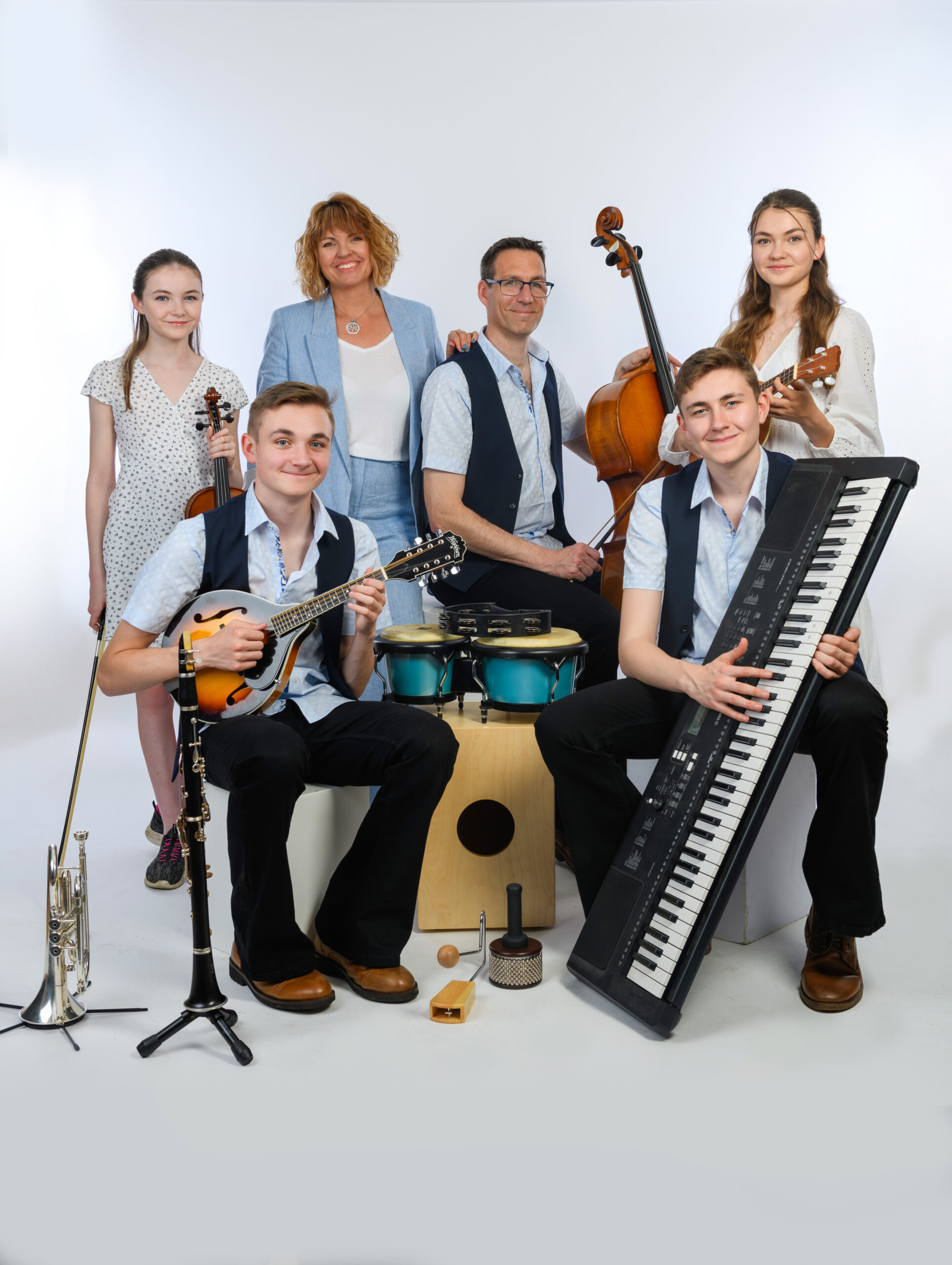 The Marsh family with their instruments