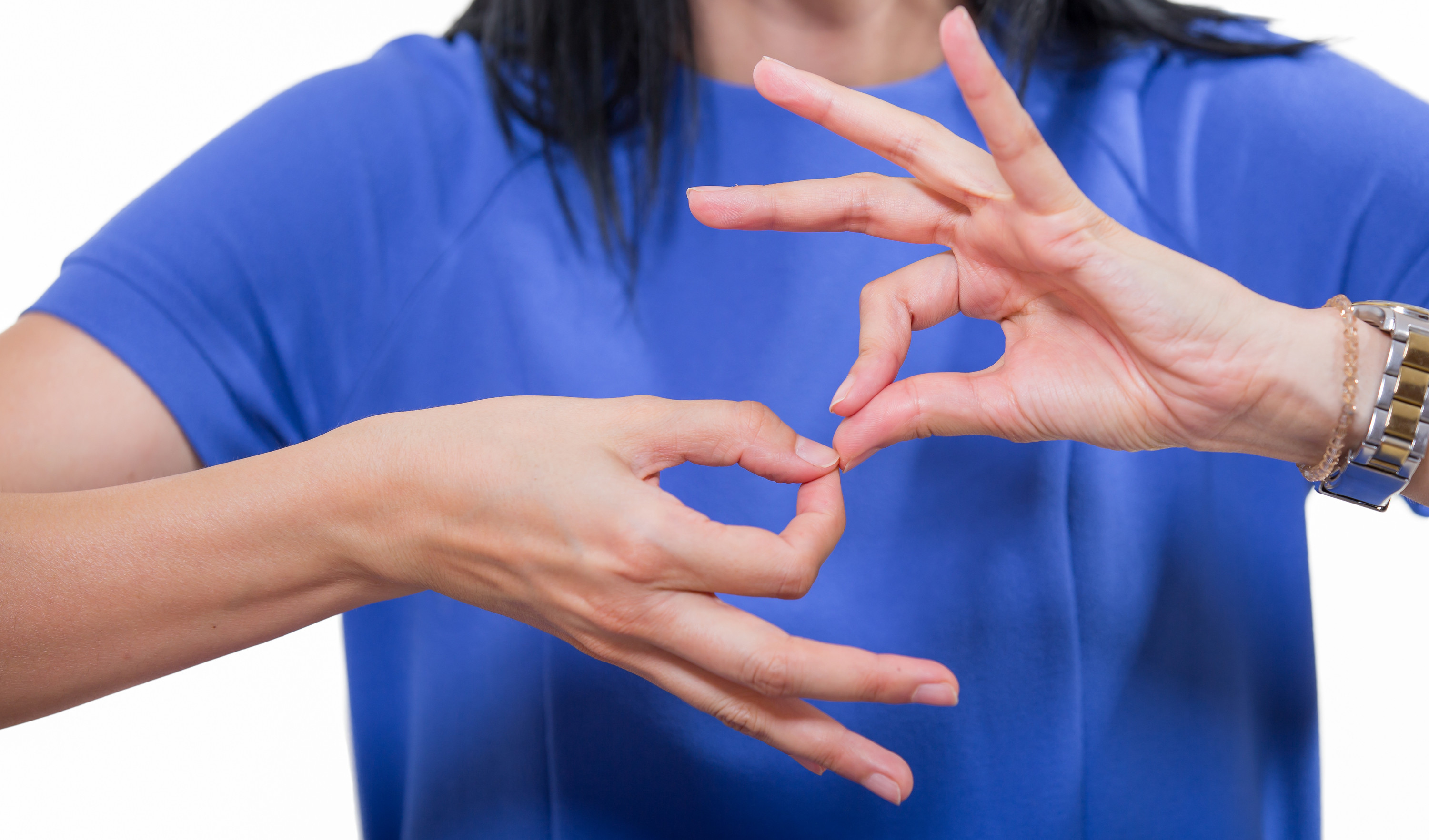 A woman using sign language