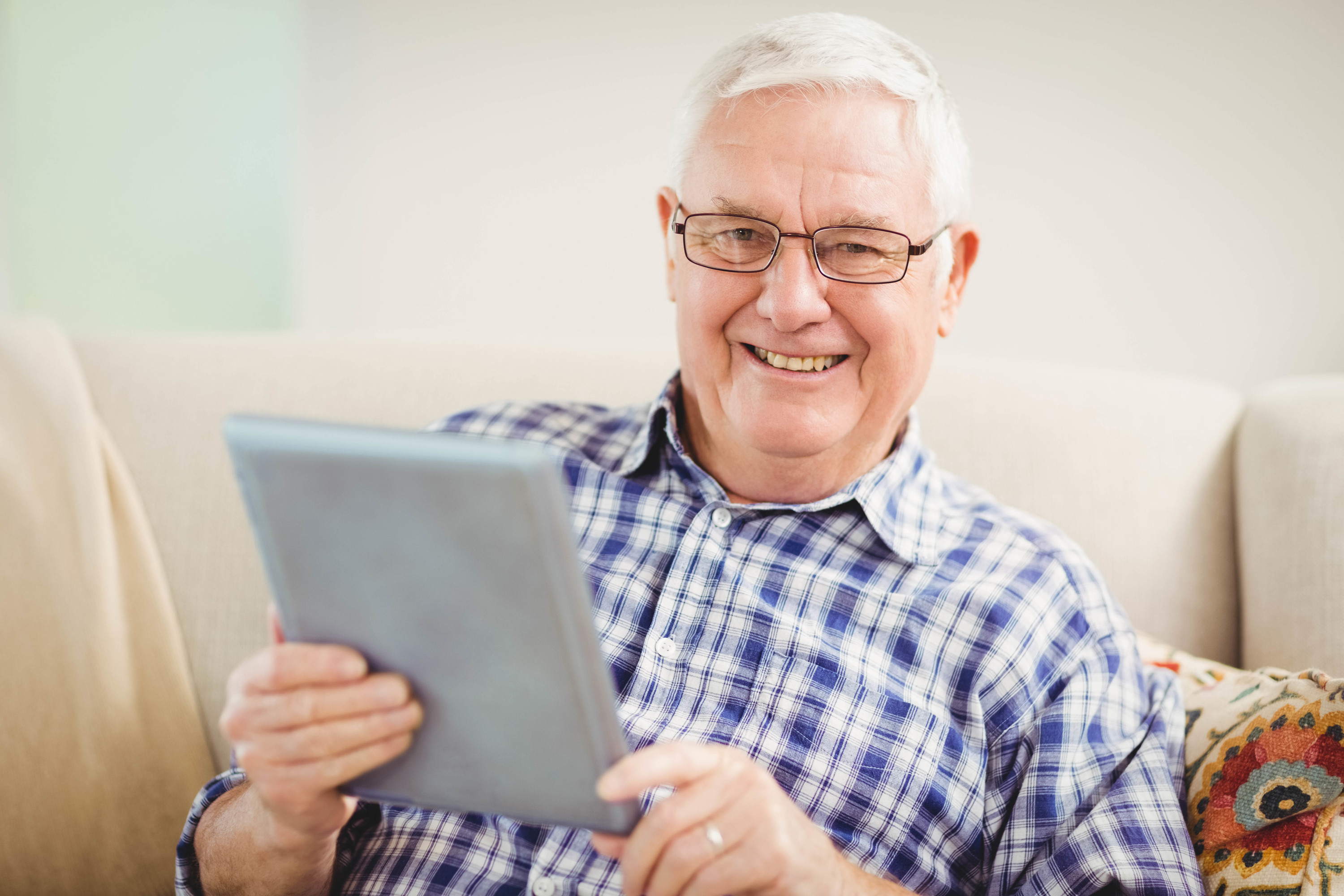 Man looking at digital tablet