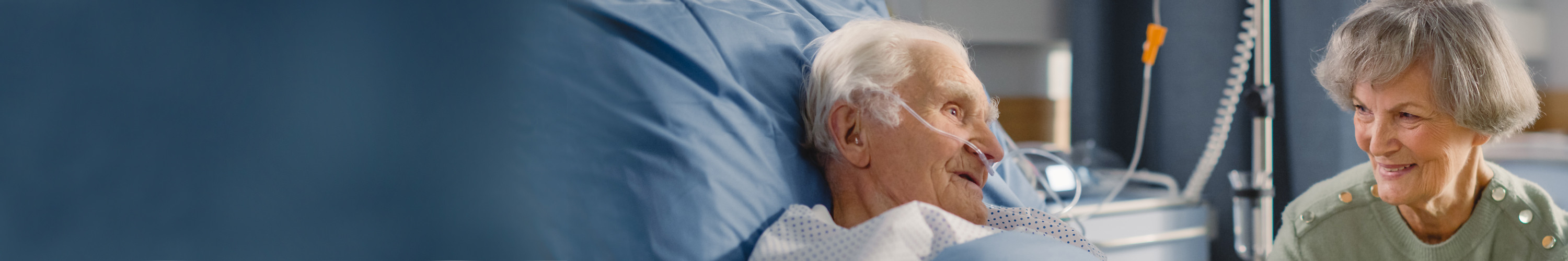 A wife visiting her husband in hospital