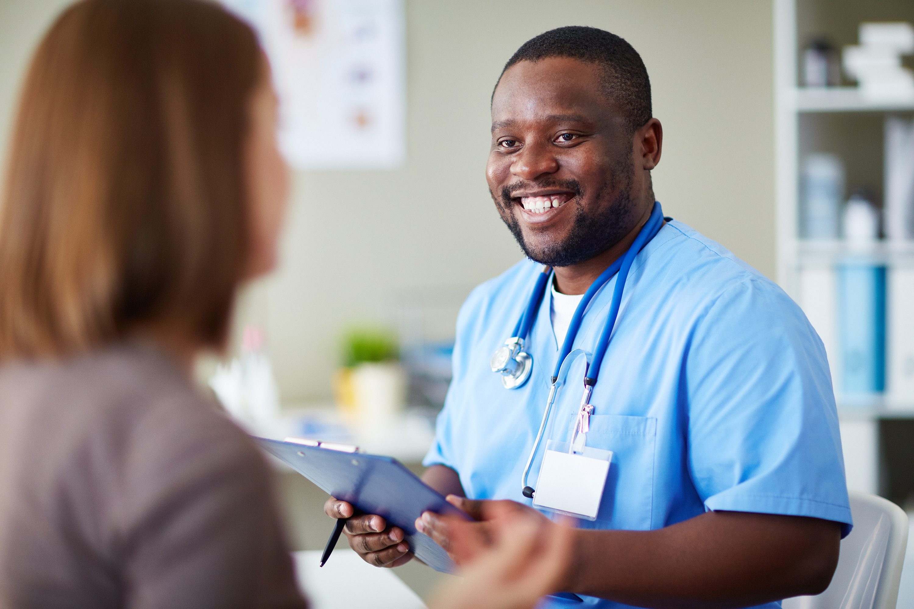 Patient with a member of the clinical team