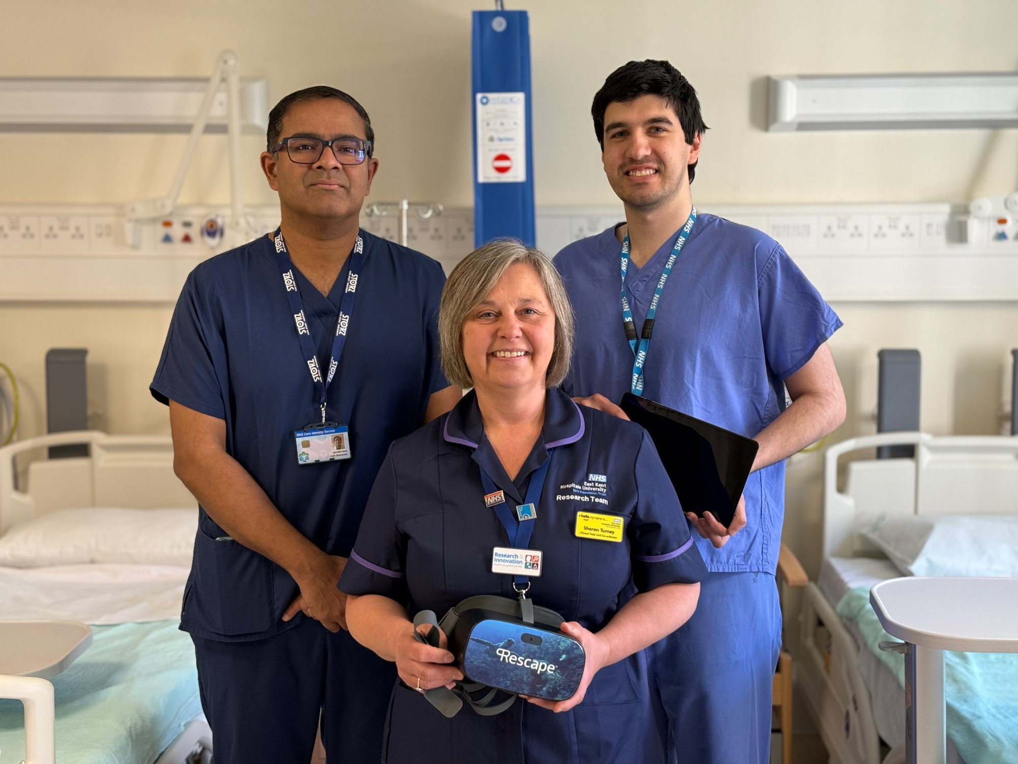 Dr Joseph Sebastian, Sharon Turney and Neil Donald with the VR headset